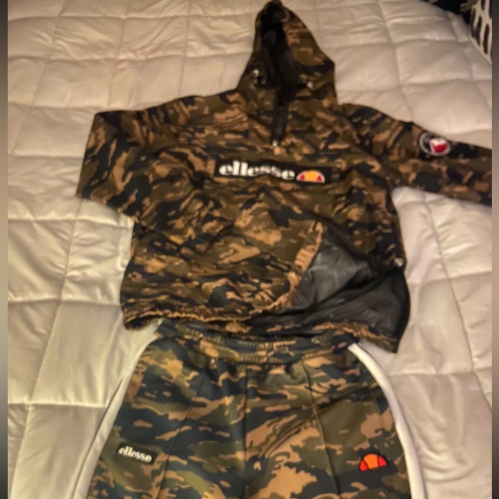ELLESSE 3 pc jogging suit. NWT. Tops are Larges and the pants are Mediums.